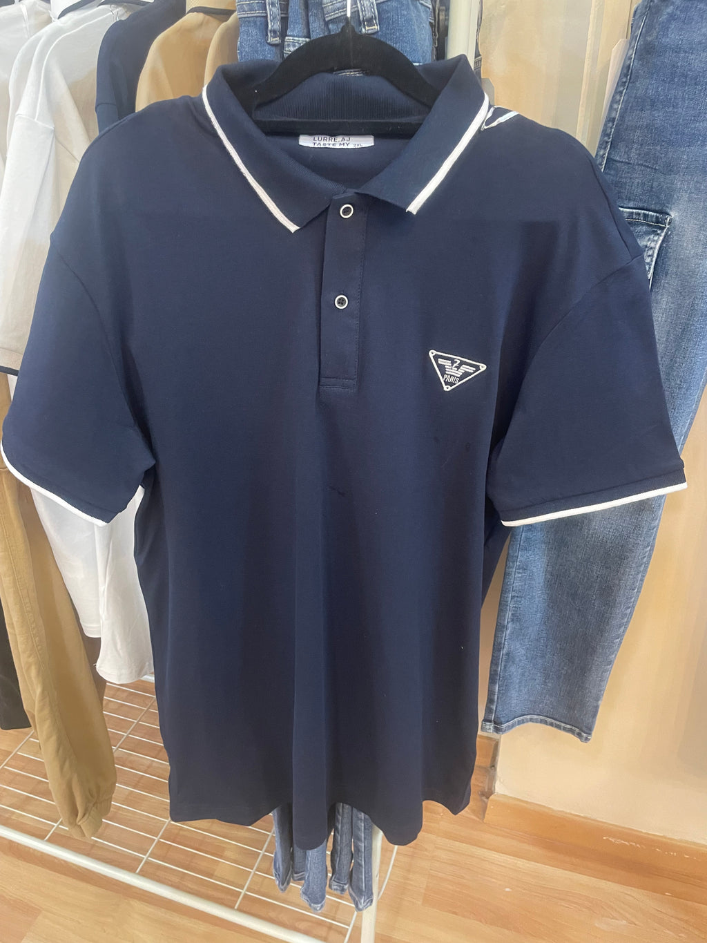 camiseta polo de algodón azul marino
