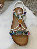 Sandalia plana super cómodas con detalles decorativos