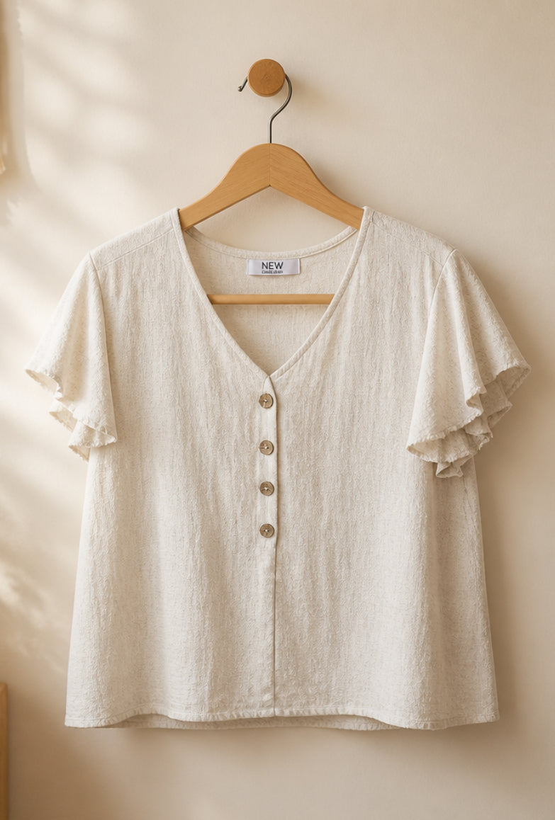 Blusa con Volantes y Botones Decorativos